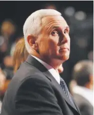  ??  ?? Republican vice presidenti­al nominee Mike Pence waits for the start of the third U.S. presidenti­al debate Wednesday in Las Vegas. Win McNamee, Getty Images