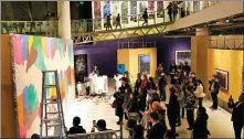  ?? PHOTOS PROVIDED TO CHINA DAILY ?? Visitors watch US graffiti artist JonOne painting at the exhibition’s opening at MoCA Shanghai on Jan 24.