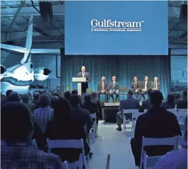  ?? WM. GLASHEEN/USA TODAY NETWORK-WISCONSIN ?? Derek Zimmerman, president of Gulfstream Product Support, announces plans to build a new service center at Appleton Internatio­nal Airport in Greenville.