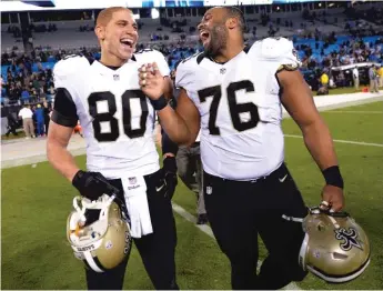  ?? GETTY IMAGES ?? Akiem Hicks (76), who played with current Bears tight end Jimmy Graham (80) on the Saints from 2012 to ’14, relishes every chance to remind coach Sean Payton (below) that he traded the wrong guy.