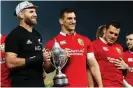  ?? Hannah Peters/Getty Images ?? Captains Kieran Read and Sam Warburton with the trophy after the Lions’ tied series in New Zealand in 2017. Photograph: