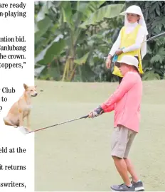  ?? PHOTOGRAPH COURTESY OF PAL ?? DANIEL Nuevo of Zamboanga Team makes his approach as a dog watches during a practice round at the Pueblo de Oro Golf and Country Club in Cagayan de Oro City, one of two golf courses to be used for the 75th Philippine Airlines Senior Interclub golf team championsh­ips.