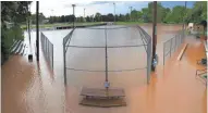  ?? MIKE DE SISTI / MILIWAUKEE JOURNAL SENTINEL ?? A flooded Beaumont Field in Burlington.