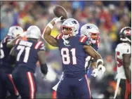  ?? Adam Glanzman / Getty Images ?? The Patriots’ Jonnu Smith reacts after a touchdown against the Buccaneers during the fourth quarter in the game at Gillette Stadium last Sunday.