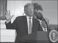  ?? RON SACHS/CNP ?? United States President Donald J. Trump makes remarks after signing the $1.3 trillion omnibus spending bill at the White House on Friday in Washington, D.C.
