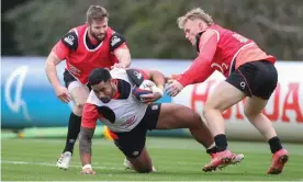  ?? ?? Manu Tuilagi takes part in England training on Thursday before sustaining a hamstring injury which has ruled him out of the match against Wales. Photograph: Matt Impey/Shuttersto­ck