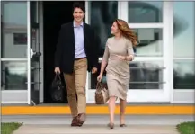  ?? The Canadian Press ?? Prime Minister Justin Trudeau and Sophie Gregoire Trudeau depart Ottawa on Tuesday en route to Washington, D.C.