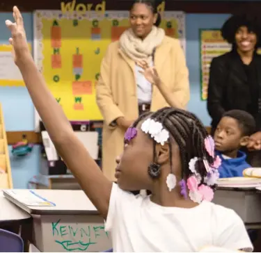  ?? ASHLEE REZIN GARCIA/SUN-TIMES ?? ABOVE: Mayor Lori Lightfoot visits a third grade class Friday at Roswell B. Mason Math & Science Academy.