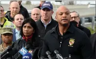  ?? BARBARA HADDOCK TAYLOR — THE BALTIMORE SUN/TNS ?? Governor Wes Moore near the bridge. Lt. Governor Aruna Miller is on left; Baltimore County Executive Johnny Olszewski is behind them, as well as Senate President Bill Ferguson.