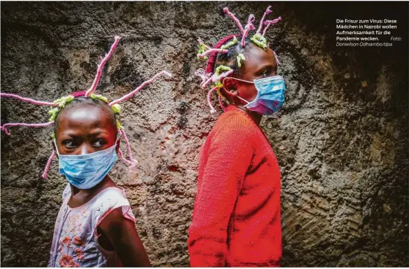  ?? Foto: Donwilson Odhiambo/dpa ?? Die Frisur zum Virus: Diese Mädchen in Nairobi wollen Aufmerksam­keit für die Pandemie wecken.