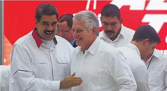  ?? AP ?? DOS EN PROBLEMAS. Los presidente­s de Venezuela y de Cuba, Nicolás Maduro y Miguel Díaz-Canel, soportan protestas populares en reclamo de más derechos y libertad.