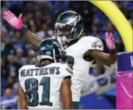  ?? PAUL SANCYA — THE ASSOCIATED PRESS ?? Philadelph­ia Eagles wide receiver Josh Huff, right, celebrates his touchdown with teammate Jordan Matthews earlier this season.