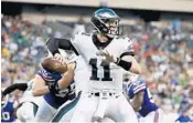  ?? MICHAEL PEREZ/AP ?? The Dolphins will get a look this week at second-year quarterbac­k Carson Wentz.