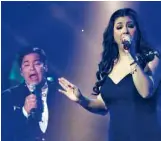  ??  ?? MARTINNiev­era and Regine Velasquez performing at themedia launch