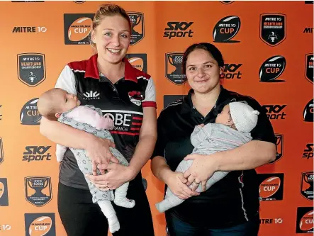  ??  ?? North Harbour’s Becky Wood, left, and Waikato’s Sosoli Talawadua have their recently born babies for company at the launch of the provincial rugby season yesterday. PHOTOSPORT