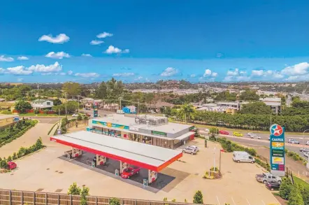  ??  ?? 2 Riverview Rd, Nerang, which hosts a Caltex service station, is on the market.