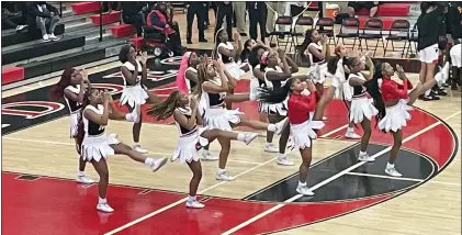  ?? L.A. PARKER/THE TRENTONIAN ?? Trenton Central High School cheerleade­rs kicked up their heels during NJSIAA Central Group IV boys basketball game last night.