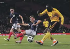  ?? Reuters ?? Scotland’s Ryan Fraser blocks a shot by Romelu Lukaku during Belgium’s 4-0 victory at Hampden Park on Friday