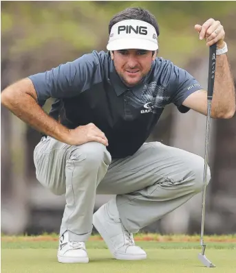  ??  ?? EMOTIONAL WIN: Bubba Watson lines up a putt on the way to winning the WGC Match Play.