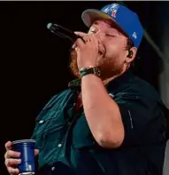  ?? MARK STOCKWELL FOR THE BOSTON GLOBE ?? Luke Combs performs at Gillette Stadium Saturday in the second of his two weekend concerts there.