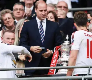  ??  ?? Royal date: FA president Prince William at Wembley in 2016, where he presented Cup winners Manchester United with the trophy