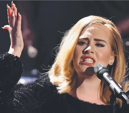  ?? Picture: SASCHA STEINBACH/GETTY IMAGES ?? Adele performs in the German city of Cologne on December 6.