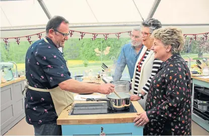  ?? Picture: Channel 4. ?? Phil failed to impress judges Paul Hollywood and Pru Leith during dairy week with his Bundt cake and Indian milk dessert in the showstoppe­r.