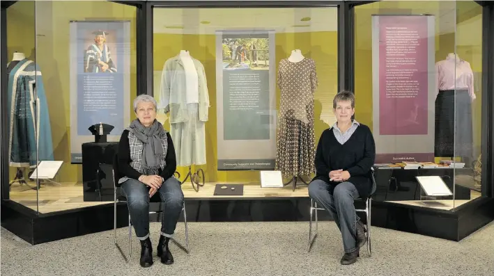  ?? Photos: LARRY WONG/EDMONTO N JOURNAL ?? Co-curators Vlada Blinova and Lori Moran sit in front of their exhibit featuring Lois Hole’s clothing and style, which opens Oct. 23 at the University of Alberta’s human ecology department.