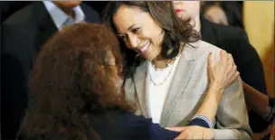  ?? CHARLIE NEIBERGALL - THE ASSOCIATED PRESS ?? Democratic presidenti­al candidate Sen. Kamala Harris, D-Calif., greets an audience member after speaking at a Women of Color roundtable, Tuesday, in Davenport, Iowa.