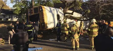  ?? HANDOUT/REUTERS ?? A Chattanoog­a, Tenn., school bus was allegedly going over the posted speed limit when it crashed on Monday, resulting in the deaths of several students.