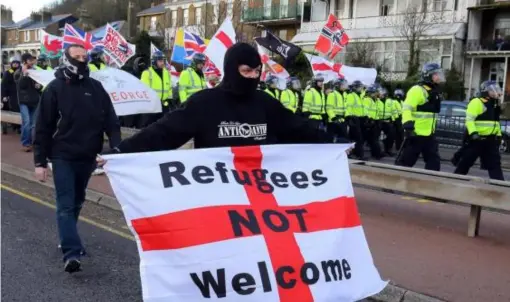  ?? (PA) ?? Far-right protesters in Dover in March