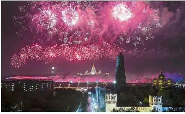  ?? — AP ?? Glittering night A fireworks show is seen over the Kremlin during a celebratio­n of 74 years since the WWII victory against German invaders in Moscow, Russia,