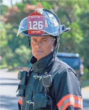  ?? JACK ZEMAN/FOX ?? Rob Lowe plays Owen Strand, a New York firefighte­r who moves to Austin, Texas, to rebuild a fire company after a tragedy, in “9-1-1: Lone Star.”