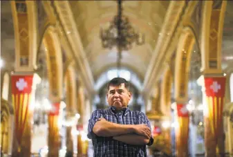  ?? Esteban Felix / Associated Press ?? Jaime Concha, standing inside La Merced Catholic Church last month in Santiago, says he was 12 years old when he was abused by Abel Perez, a Marist brother, during a boy scout field trip.