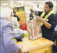  ?? Hearst Connecticu­t Media file photo ?? Customers shop at the Trader Joe’s in Stamford