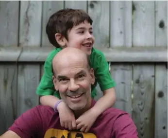  ?? ANNIE SAKKAB/THE RECORD ?? Columnist Joel Rubinoff in a light moment with his son, Max, 7, who has autism.