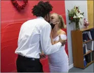  ?? ?? Daquane Williams, and Trisha Jayn Williams kiss during their wedding ceremony. At Magisteria­l District Court 23-2-02in West Reading, PA Monday February 14, 2022 where Magisteria­l District Judge Hon. Eric J. Taylor spent Valentine’s Day marrying couples.