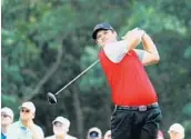  ?? KEVIN C. COX/GETTY IMAGES ?? Patrick Reed, at 8-under 134 after 2 rounds, tees off at No. 10 Friday on Bethpage’s Black Course in New York.