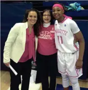 ?? PHOTO COURTESY OF JULIE TAGGART ?? Julie Taggart is flanked by Marquette women’s basketball head coach Carolyn Kieger (left) and star player Allazia Blockton at the 2016 pink game to raise awareness of breast cancer.