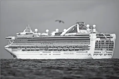  ?? NOAH BERGER/AP PHOTO ?? Carrying people who have tested positive for COVID-19, the Grand Princess maintains a holding pattern Sunday about 30 miles off the coast of San Francisco. The cruise ship is scheduled to dock today at the Port of Oakland.