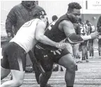  ?? PHOTO COURTESY OF 247SPORTS. COM ?? Defensive tackle Jalen Carter, right, of Apopka, Florida, committed Monday afternoon to the Georgia Bulldogs.