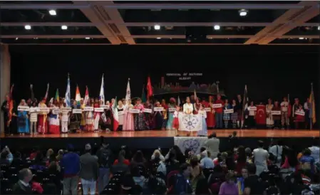  ?? BY LAUREN HALLIGAN — LHALLIGAN@DIGITALFIR­STMEDIA.COM ?? Ethnic groups gather on stage at the 2018 Festival of Nations on Sunday in Albany.