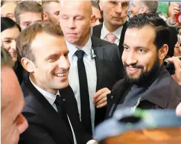  ?? PHOTO D’ARCHIVES, AFP ?? Le président Emmanuel Macron est escorté par son ancien garde du corps Alexandre Benalla sur cette photo d’archives.