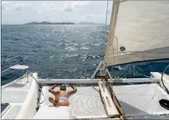  ?? PHOTOS BY ERIK FREELAND
THE NEW YORK TIMES ?? ABOVE: The Wind Kat, a 34-foot catamaran, is a floating Airbnb that sails from island to island in St. Vincent and the Grenadines.