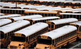  ?? Photograph: Olivier Douliery/AFP via Getty Images ?? Across the US, 124,000 schools are closed due to coronaviru­s.