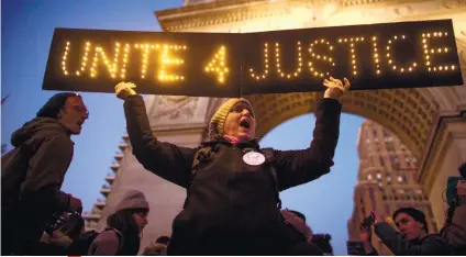  ??  ?? Protesters shout slogans during a rally against President Donald Trump’s order cracking down on immigrants living in the US at Washington Square Park in New York, Wednesday.