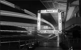  ?? PHOTO COURTESY OF DRL ?? Drones race through a gate during a Drone Racing League competitio­n. The DRL’S Algorand World Championsh­ip Season finale is set for 6:30 p.m. today outside T-mobile Arena.