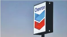  ??  ?? A Chevron gas station sign is shown in Cardiff, California, in this file photo. — Reuters photo