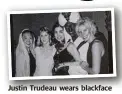  ?? TIME MAGAZINE Picture: AFP/ ?? Justin Trudeau wears blackface at a party in 2001.