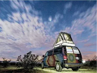 ?? [PHOTO PROVIDED BY ALEX MAUZ] ?? With the addition of an optional rooftop tent, four people can sleep comfortabl­y in the artist-painted Escape Campervans. They come with a queen-size bed, bedding and basic kitchen and camping gear.